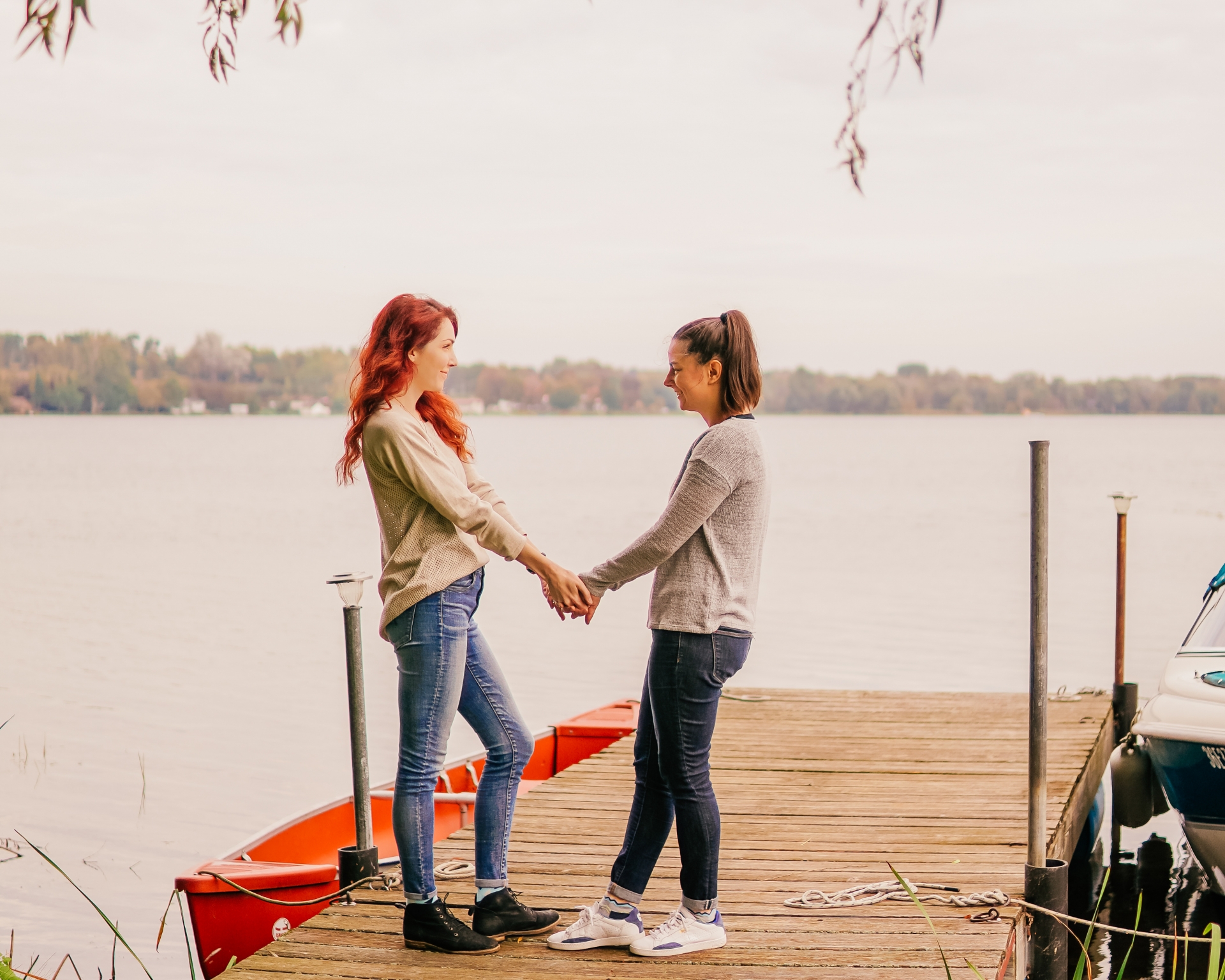 Lesbians Hand in Hand at Lake