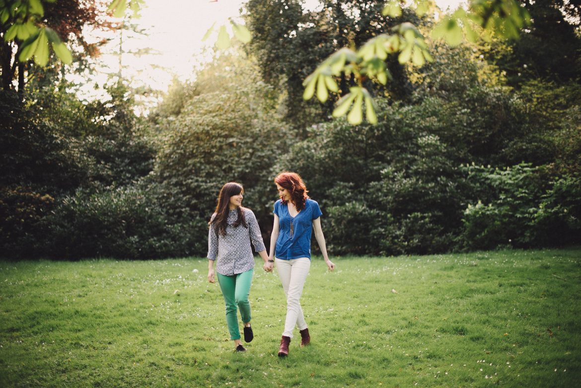 Lesbian Couple Hold Hands Park