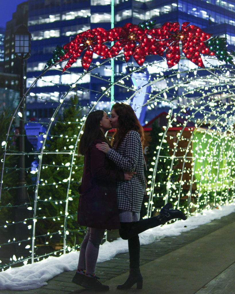 Lesbian Couple Kiss Christmas Lights