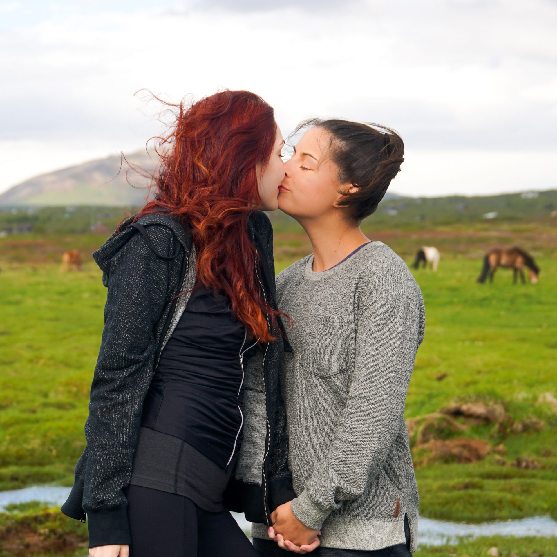 Lesbian Couple Kiss Iceland Horses