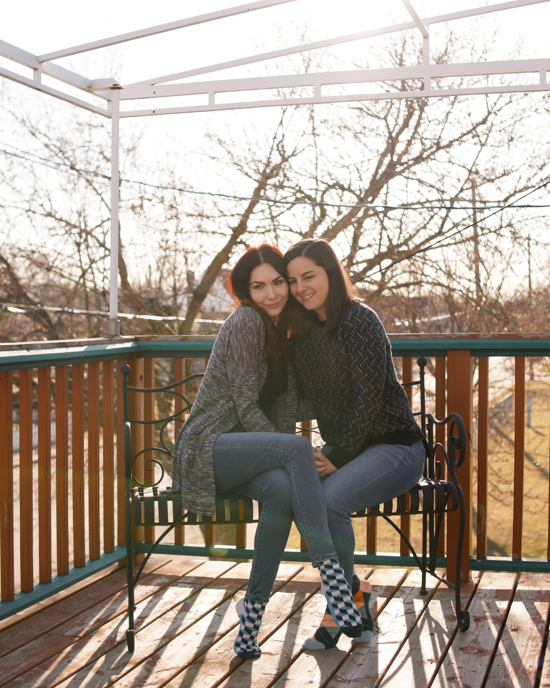 Lesbian Couple Bench Balcony