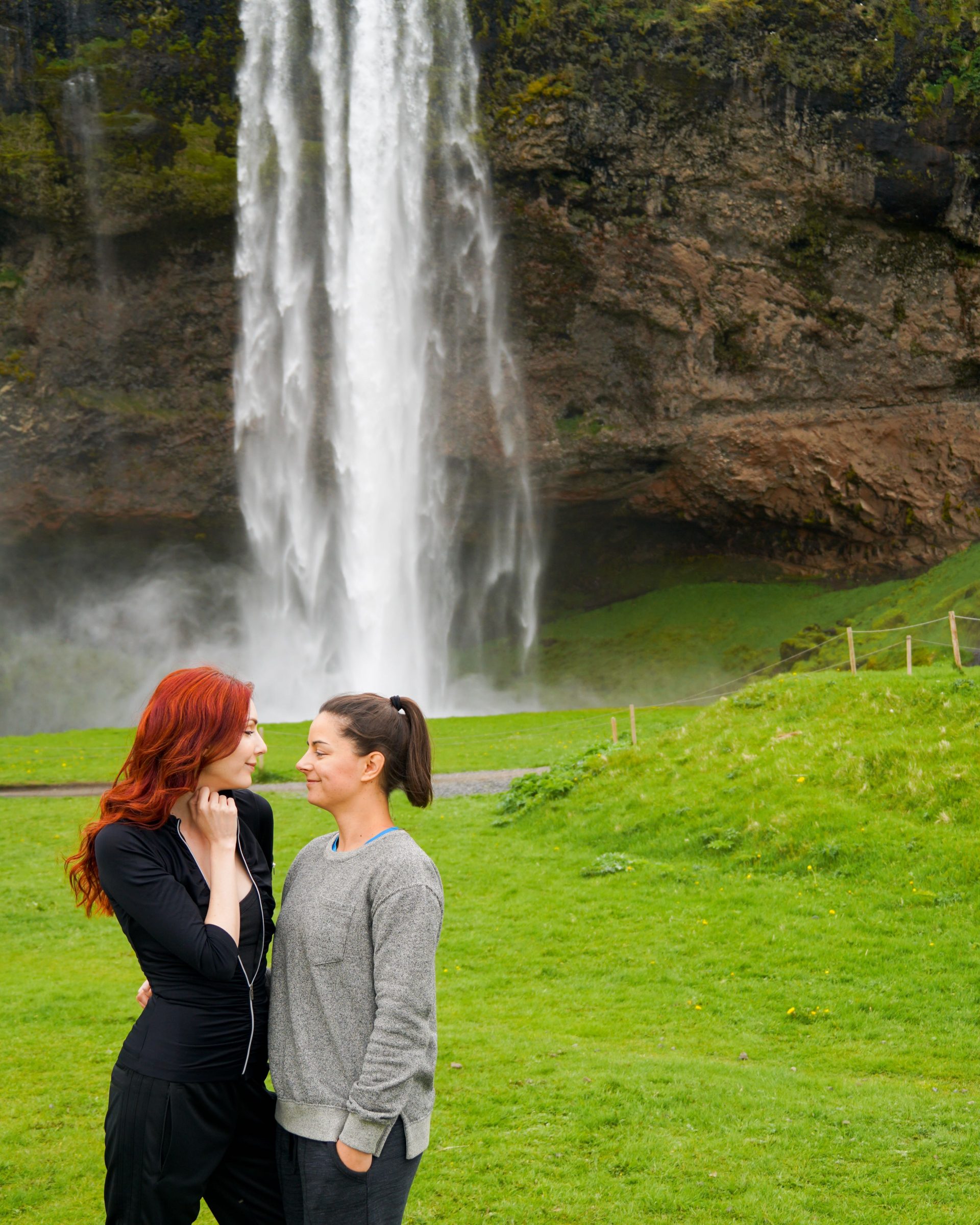 Lesbian Couple Iceland Waterfall