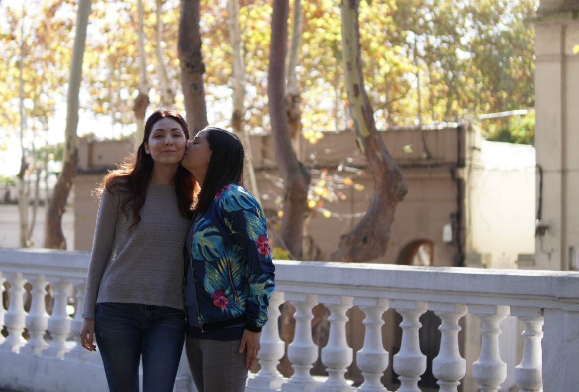 Lesbian Couple Kiss on Cheek Uruguay