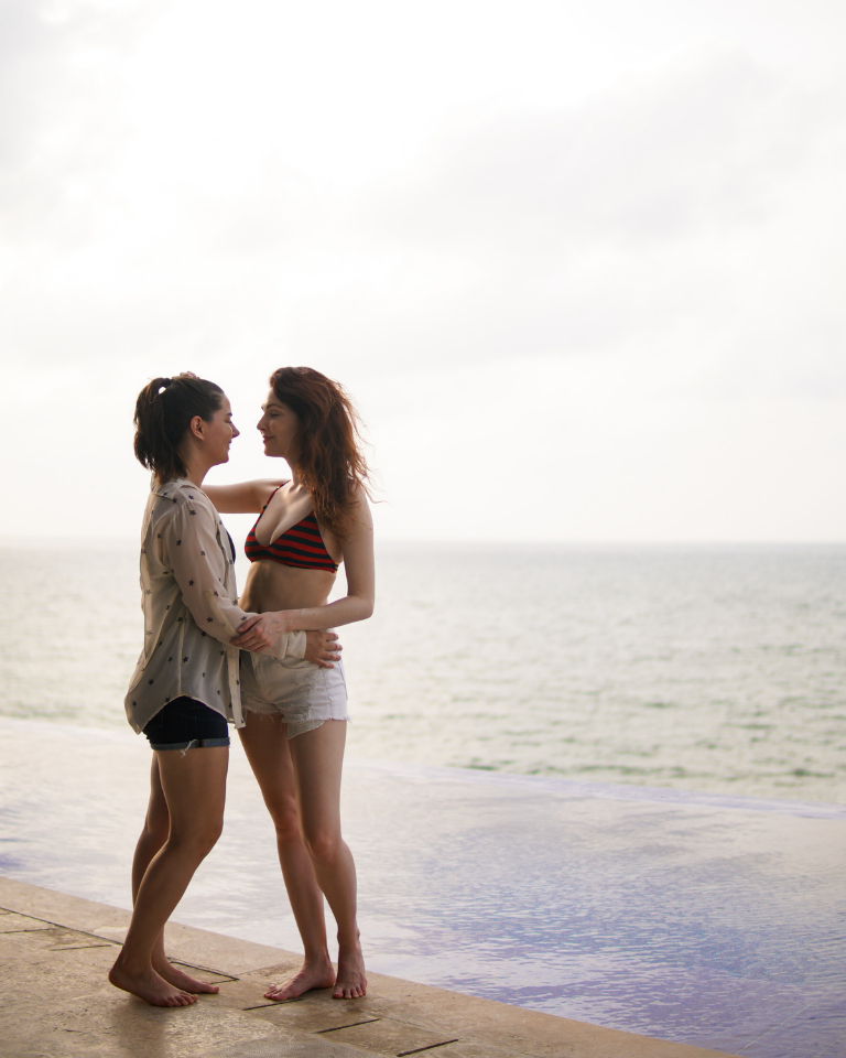 Lesbians Making Out In Pool