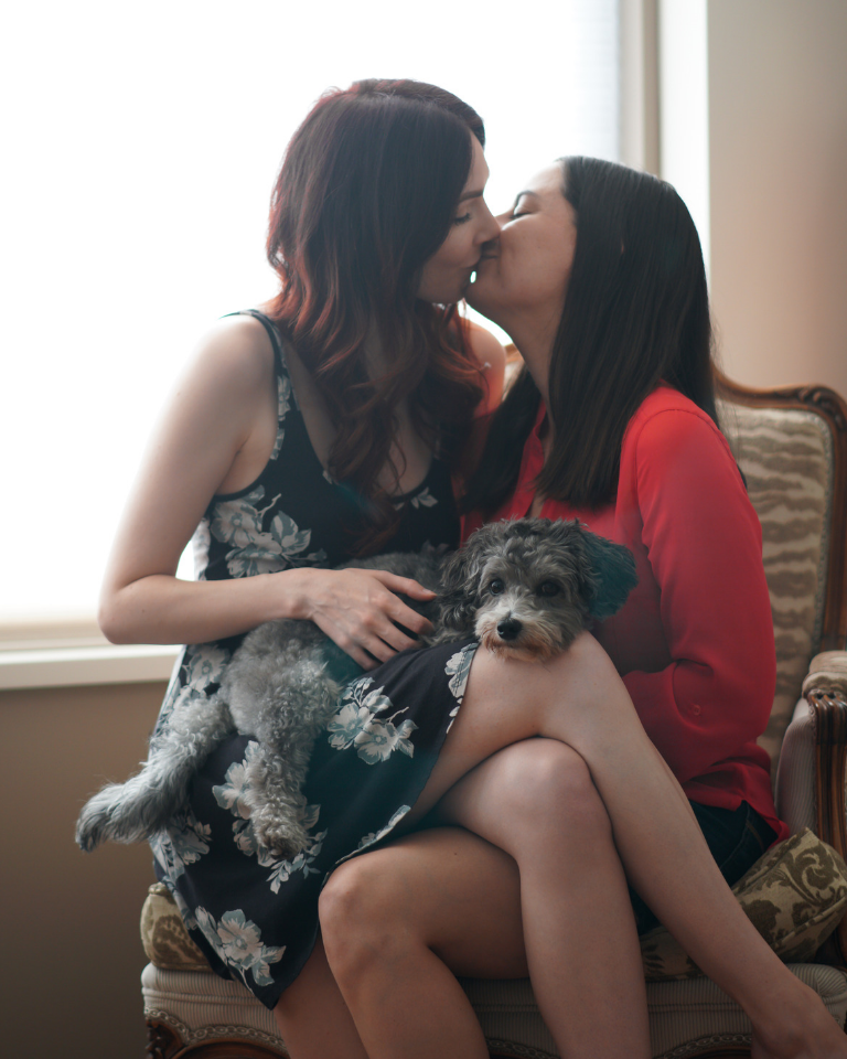 Lesbian Couple Kiss Cute Dog