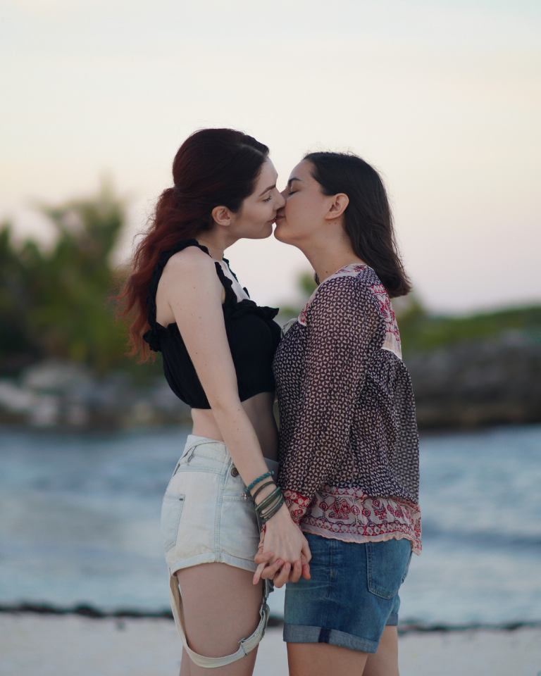 Lesbian Couple Kiss on Beach