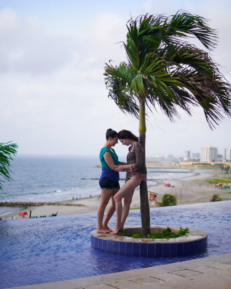 Lesbian Couple Pool Cartagena Palm Tree