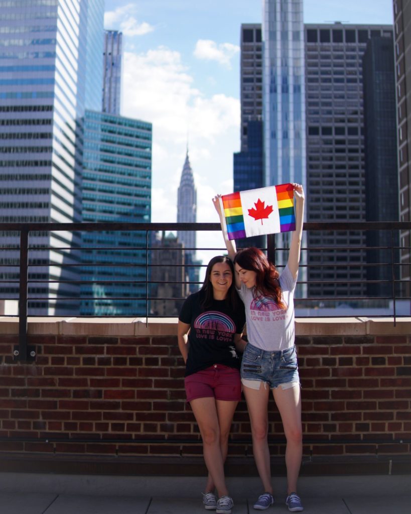 Lesbian Couple NYC Rooftop Pride Rainbow Flag