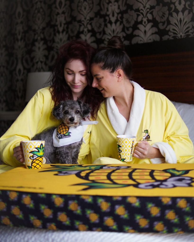 Lesbian Couple Staypineapple Room with dog