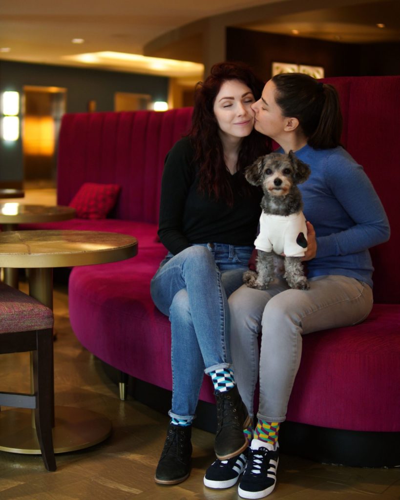 Lesbian Couple Staypineapple Lobby with dog