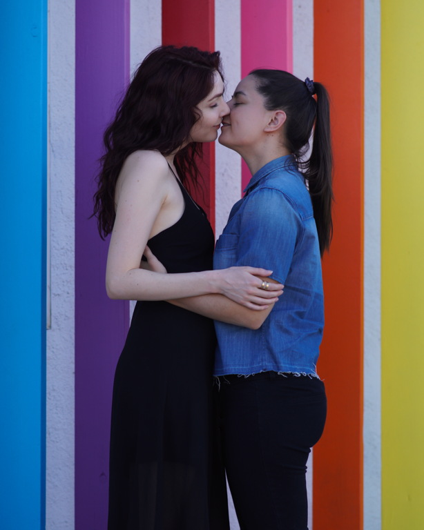 Lesbian Couple Kiss Rainbow Wall